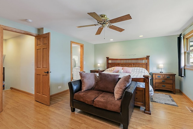 bedroom with light wood-type flooring, baseboards, recessed lighting, ceiling fan, and connected bathroom