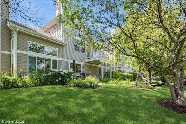 229 Concord Ln Unit 229, Carol Stream, IL 60188 - back of house with a chimney and a lawn