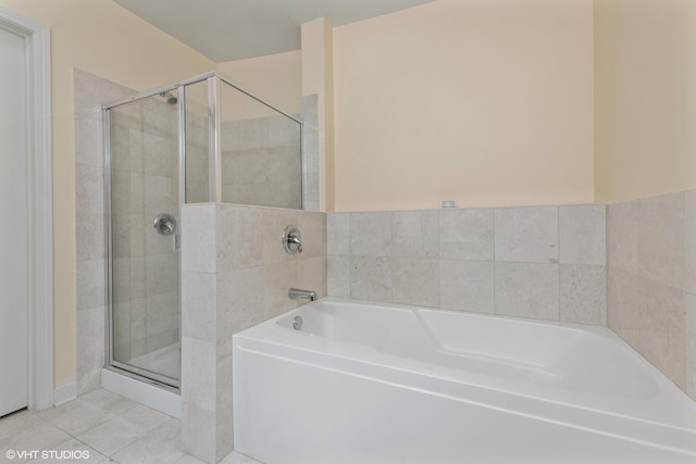 225 N Columbus Dr Unit 6006, Chicago, IL 60601 - bathroom featuring a stall shower, tile patterned flooring, and a bath