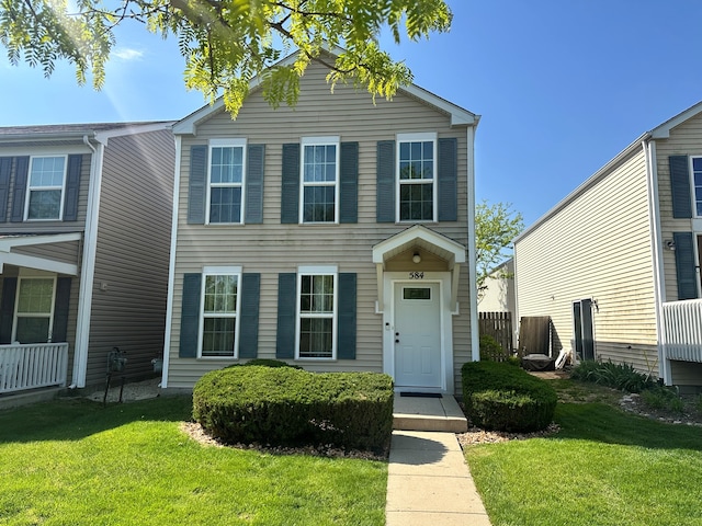 584 Four Seasons Blvd, Aurora, IL 60504 - view of front of property featuring a front lawn