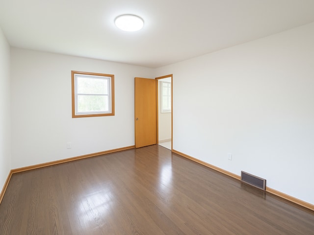112 Burton Ave, Waukegan, IL 60085 - unfurnished room featuring wood finished floors and baseboards