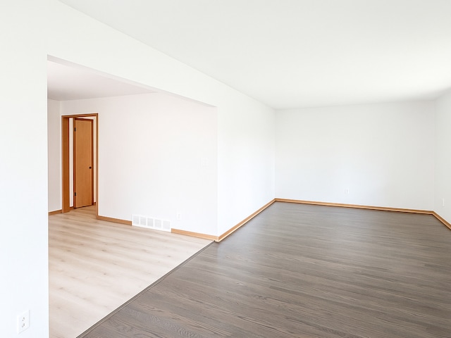 112 Burton Ave, Waukegan, IL 60085 - empty room featuring wood finished floors and baseboards