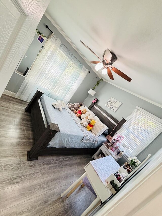 321 Lewis Ave, Wauconda, IL 60084 - bedroom with wood finished floors and ceiling fan