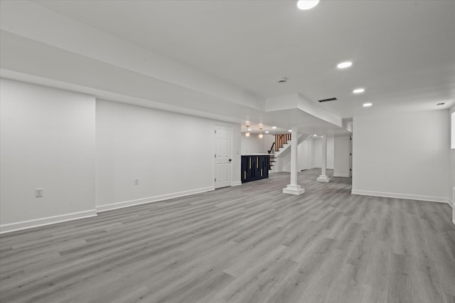 8241 S Aberdeen St, Chicago, IL 60620 - finished below grade area with baseboards, stairway, light wood finished floors, and recessed lighting