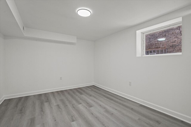 8241 S Aberdeen St, Chicago, IL 60620 - unfurnished room featuring wood finished floors and baseboards