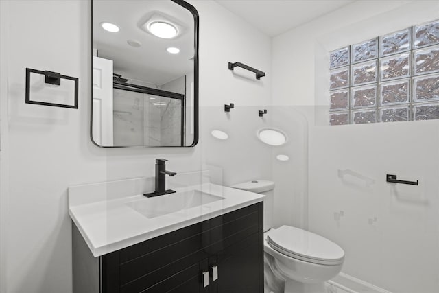 8241 S Aberdeen St, Chicago, IL 60620 - bathroom with a stall shower, toilet, and vanity