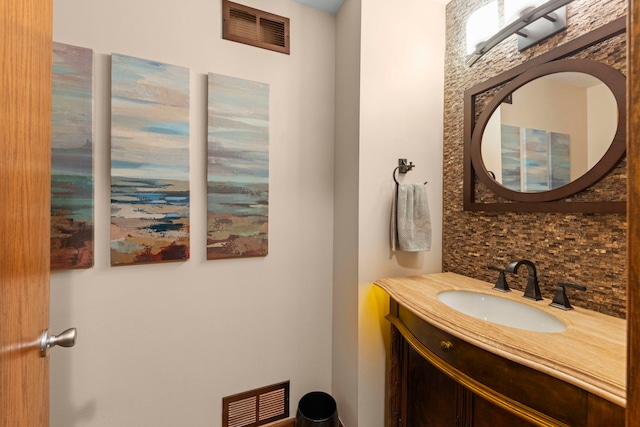608 61st St, Lisle, IL 60532 - bathroom featuring vanity and decorative backsplash