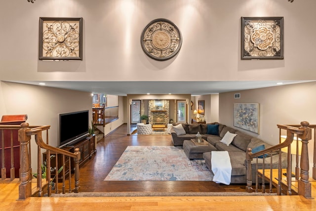 608 61st St, Lisle, IL 60532 - living room featuring a high ceiling, wood finished floors, and stairs
