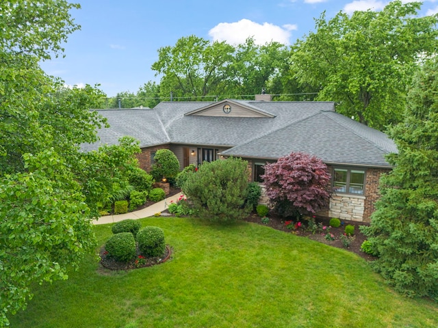 608 61st St, Lisle, IL 60532 - view of front of home with a shingled roof, a front lawn, and brick siding