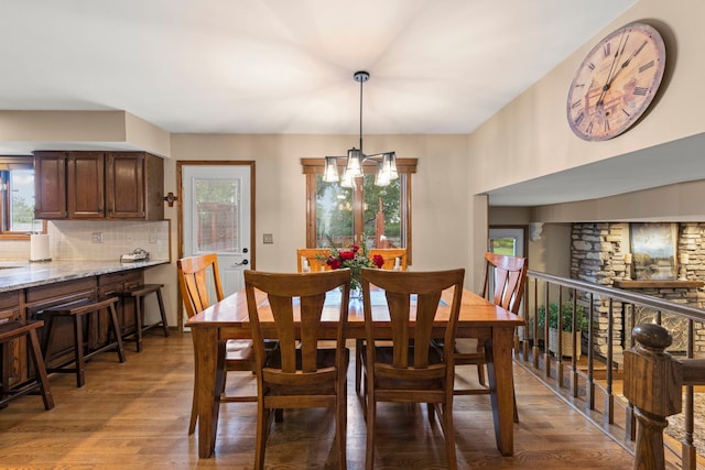 608 61st St, Lisle, IL 60532 - dining area with healthy amount of natural light and wood finished floors