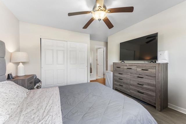 1787 W Algonquin Rd Unit 1B, Mount Prospect, IL 60056 - bedroom featuring wood finished floors, baseboards, a closet, and ceiling fan