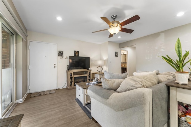 1787 W Algonquin Rd Unit 1B, Mount Prospect, IL 60056 - living area featuring recessed lighting, a ceiling fan, wood finished floors, and baseboards