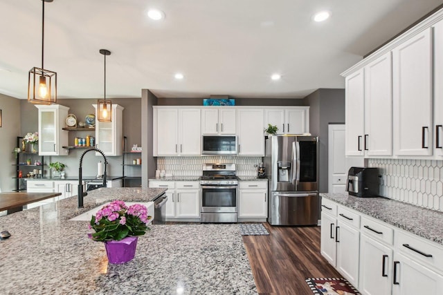 4144 Calder Ln, Aurora, IL 60504 - kitchen featuring stainless steel appliances, decorative backsplash, open shelves, white cabinetry, and recessed lighting