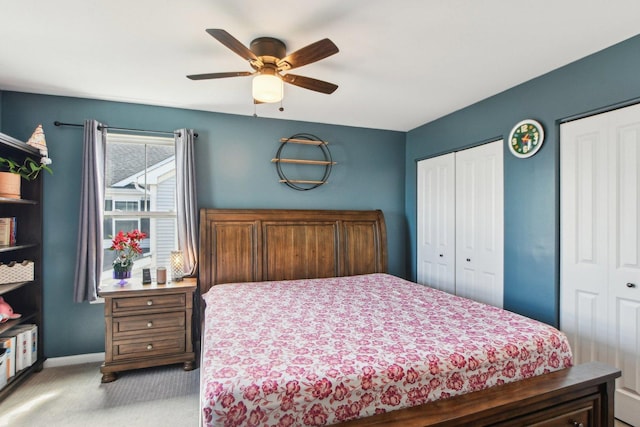 4144 Calder Ln, Aurora, IL 60504 - carpeted bedroom featuring baseboards, ceiling fan, and two closets