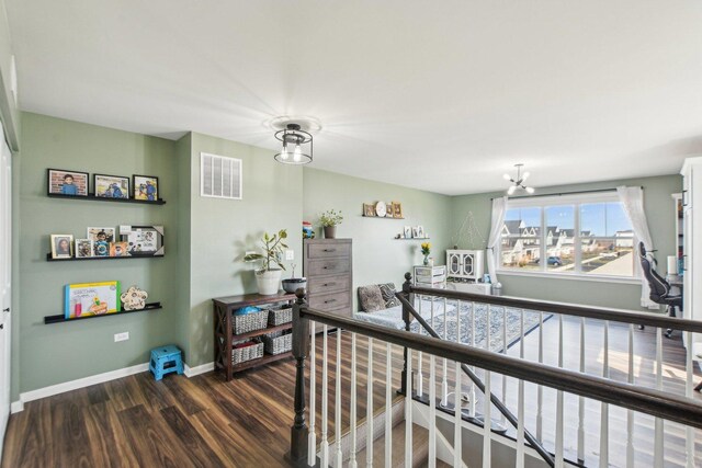 4144 Calder Ln, Aurora, IL 60504 - hall featuring dark wood-type flooring, an upstairs landing, baseboards, and a chandelier
