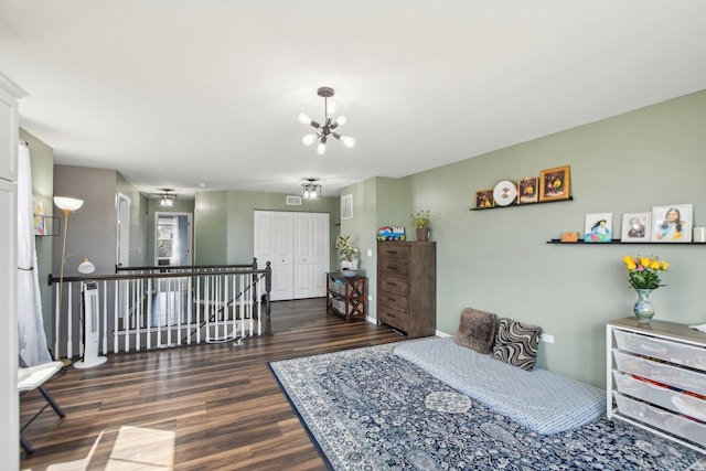 4144 Calder Ln, Aurora, IL 60504 - bedroom featuring wood finished floors, a chandelier, and a closet