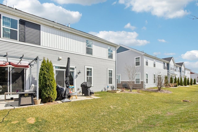 4144 Calder Ln, Aurora, IL 60504 - rear view of house featuring a pergola, a yard, a residential view, and board and batten siding