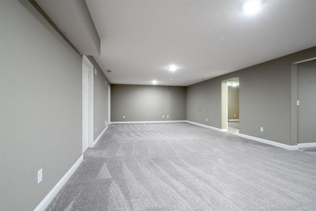 1172 Hershey Rd, Normal, IL 61761 - finished below grade area with light carpet and baseboards