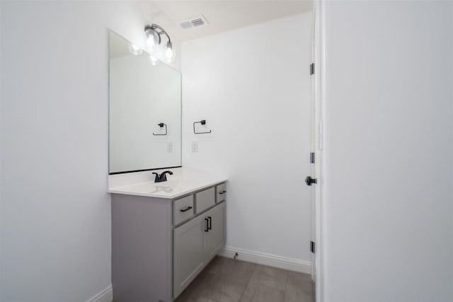 1172 Hershey Rd, Normal, IL 61761 - bathroom featuring vanity, baseboards, and tile patterned floors