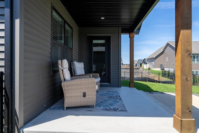 1172 Hershey Rd, Normal, IL 61761 - view of patio / terrace with fence and a residential view