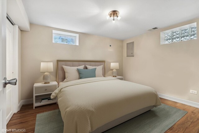 7337 N Mcvicker Ave, Chicago, IL 60646 - bedroom featuring baseboards and wood finished floors