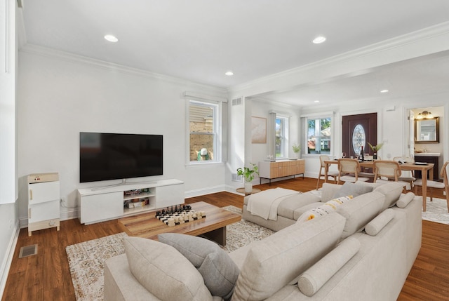 7337 N Mcvicker Ave, Chicago, IL 60646 - living area featuring crown molding, baseboards, wood finished floors, and recessed lighting