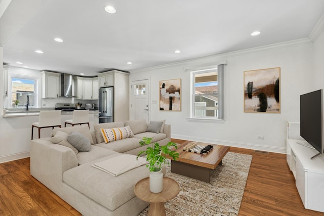 7337 N Mcvicker Ave, Chicago, IL 60646 - living area with recessed lighting, baseboards, ornamental molding, and dark wood-type flooring