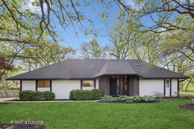 S070 River Ln, Winfield, IL 60190 - view of front facade with a front yard and roof with shingles