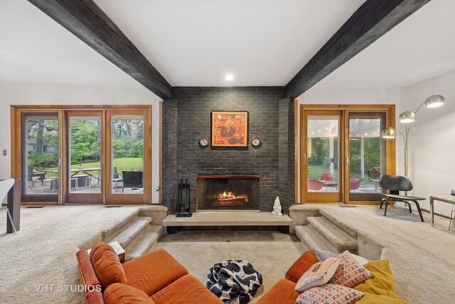 S070 River Ln, Winfield, IL 60190 - living room featuring carpet flooring, beamed ceiling, healthy amount of natural light, and a brick fireplace