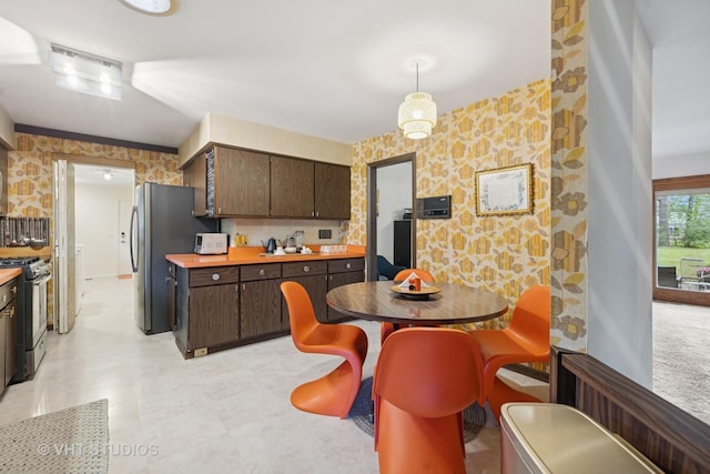 S070 River Ln, Winfield, IL 60190 - kitchen with stainless steel appliances, dark brown cabinets, and light countertops