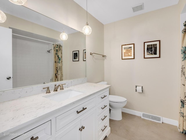 7102 Walden Ln, Darien, IL 60561 - bathroom with baseboards, toilet, vanity, a shower with shower curtain, and tile patterned flooring