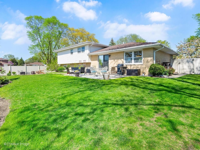 7102 Walden Ln, Darien, IL 60561 - rear view of house with brick siding, a patio area, and an outdoor living space