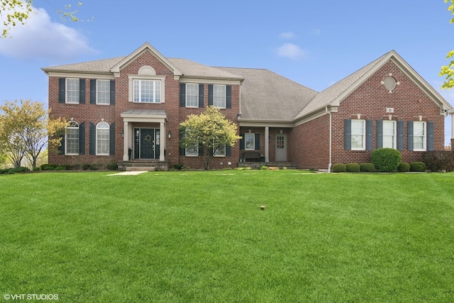 11 Crystal Downs Dr, Hawthorn Woods, IL 60047 - colonial house featuring brick siding, a front lawn, and a shingled roof