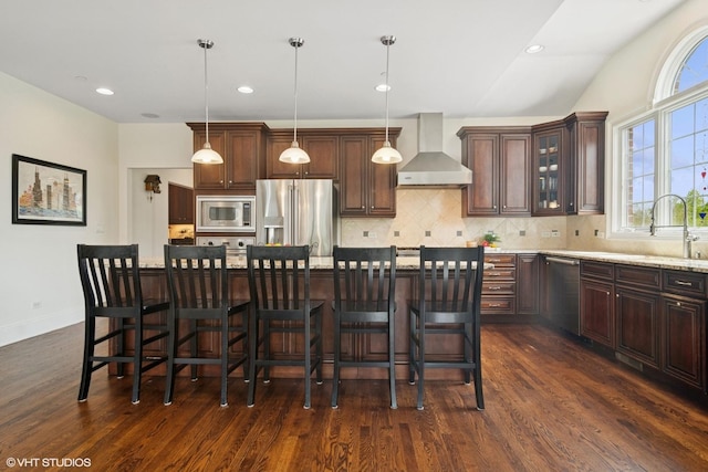 11 Crystal Downs Dr, Hawthorn Woods, IL 60047 - kitchen with wall chimney range hood, stainless steel appliances, dark wood-style floors, decorative backsplash, and recessed lighting