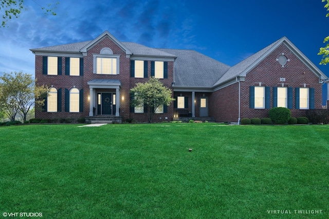 11 Crystal Downs Dr, Hawthorn Woods, IL 60047 - colonial-style house featuring brick siding, a front yard, and roof with shingles