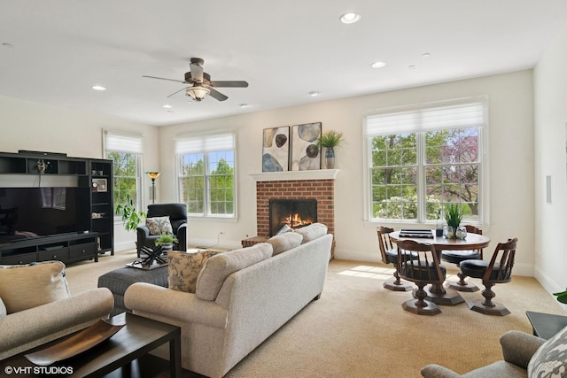 11 Crystal Downs Dr, Hawthorn Woods, IL 60047 - living room featuring light carpet, ceiling fan, a fireplace, and recessed lighting