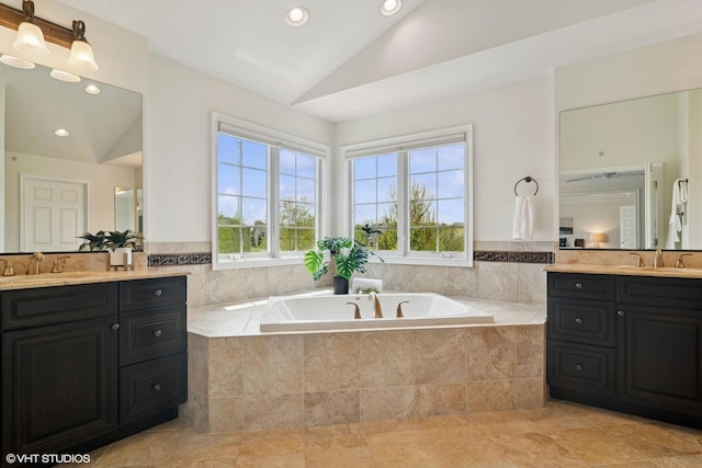 11 Crystal Downs Dr, Hawthorn Woods, IL 60047 - full bath with two vanities, lofted ceiling, plenty of natural light, a garden tub, and recessed lighting