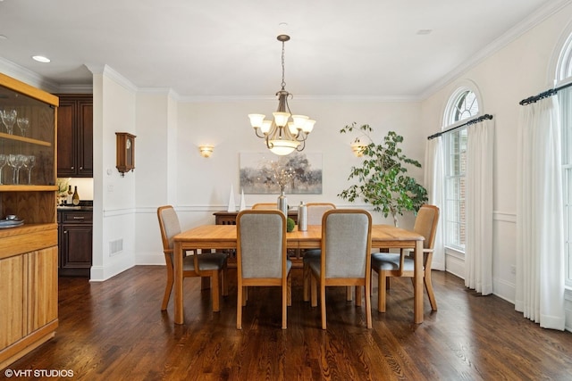 11 Crystal Downs Dr, Hawthorn Woods, IL 60047 - dining area with a chandelier, dark wood finished floors, and crown molding