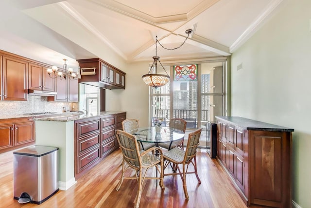 25 E Superior St Unit 2501, Chicago, IL 60611 - dining space with light wood-style floors, a chandelier, coffered ceiling, ornamental molding, and beam ceiling