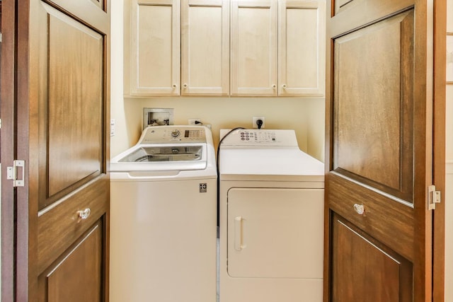 25 E Superior St Unit 2501, Chicago, IL 60611 - laundry room featuring washer and clothes dryer and cabinet space