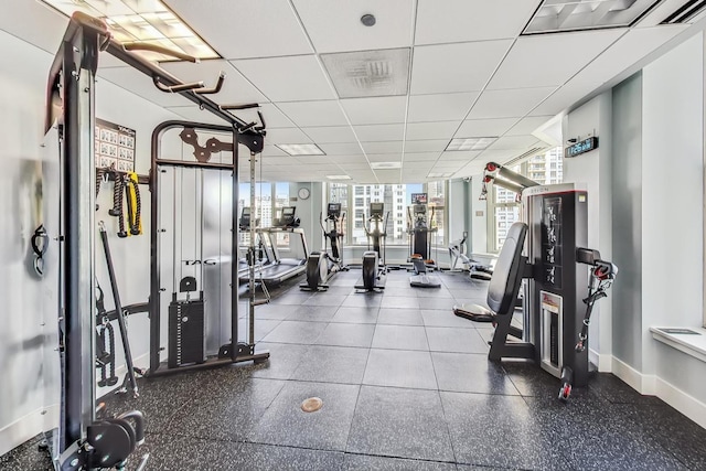 25 E Superior St Unit 2501, Chicago, IL 60611 - exercise room with baseboards and a drop ceiling