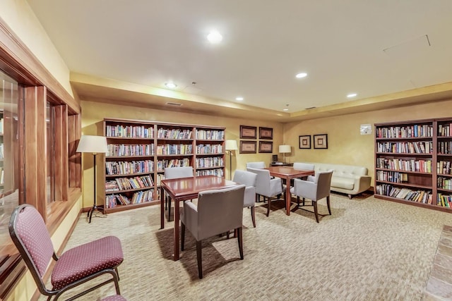 25 E Superior St Unit 2501, Chicago, IL 60611 - office space featuring wall of books, recessed lighting, carpet floors, and a raised ceiling