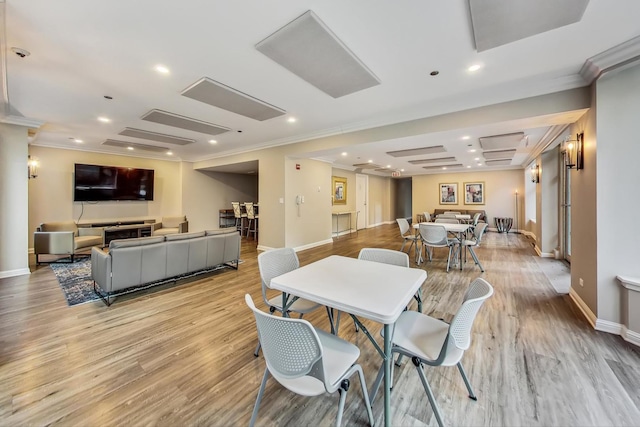 25 E Superior St Unit 2501, Chicago, IL 60611 - dining area featuring crown molding, baseboards, light wood-style floors, and recessed lighting