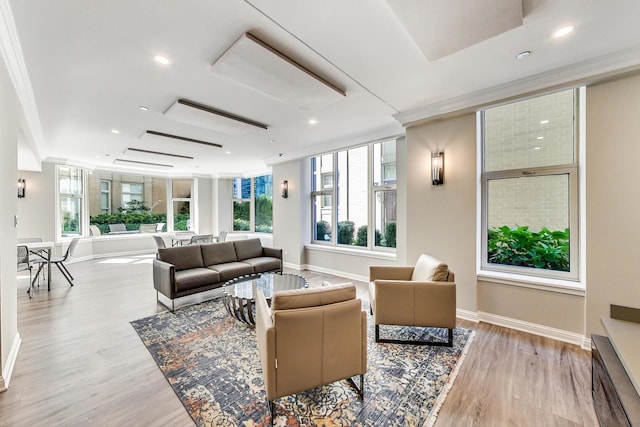 25 E Superior St Unit 2501, Chicago, IL 60611 - living room with light wood-style flooring, baseboards, ornamental molding, and recessed lighting