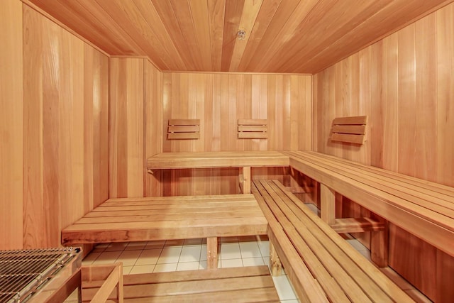 25 E Superior St Unit 2501, Chicago, IL 60611 - relaxing sauna / steam room featuring tile patterned flooring, wood walls, and wooden ceiling