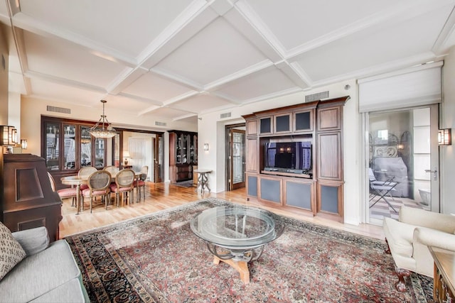 25 E Superior St Unit 2501, Chicago, IL 60611 - living room featuring coffered ceiling, light wood-style floors, and beam ceiling