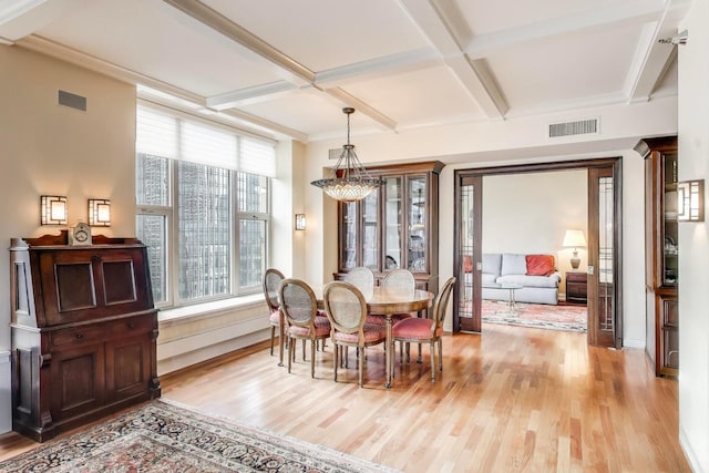 25 E Superior St Unit 2501, Chicago, IL 60611 - dining area with coffered ceiling, light wood-style floors, and beamed ceiling