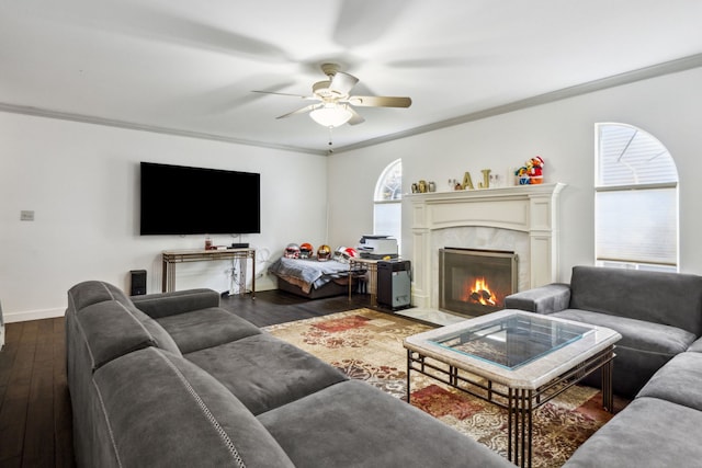 2105 Primrose Dr, Plainfield, IL 60586 - living room with a ceiling fan, a premium fireplace, ornamental molding, plenty of natural light, and wood finished floors