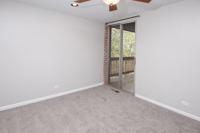 carpeted spare room featuring a ceiling fan, baseboards, and recessed lighting
