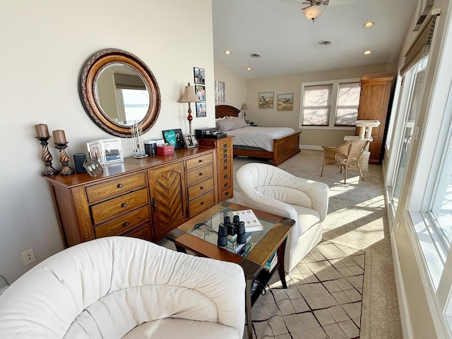 bedroom featuring light carpet, recessed lighting, baseboards, and lofted ceiling